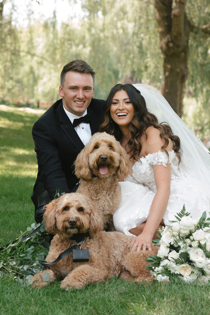 Bride and groom with their golden doodles at vineyard wedding in Canton | J. Lynne Photography