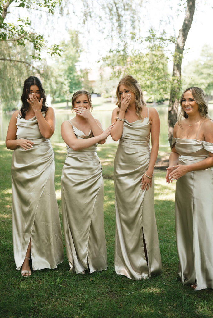 Bridesmaid's first look at wedding dress at vineyard wedding in Ohio | J. Lynne Photography
