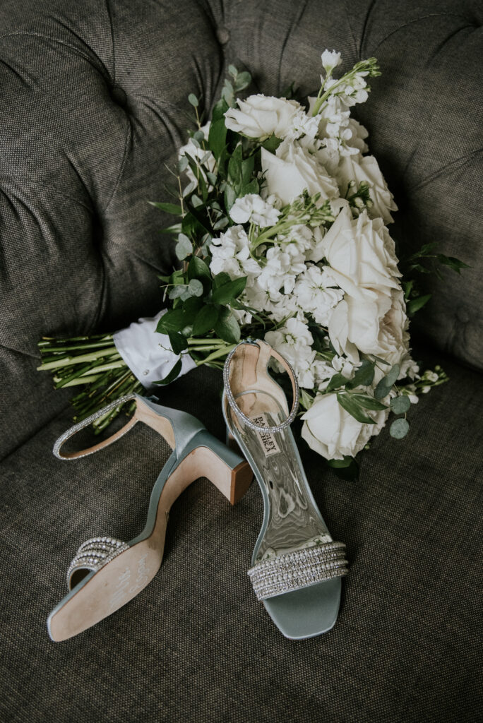 Bride's wedding shoes and bouquet at wedding in Cleveland | J. Lynne Photography