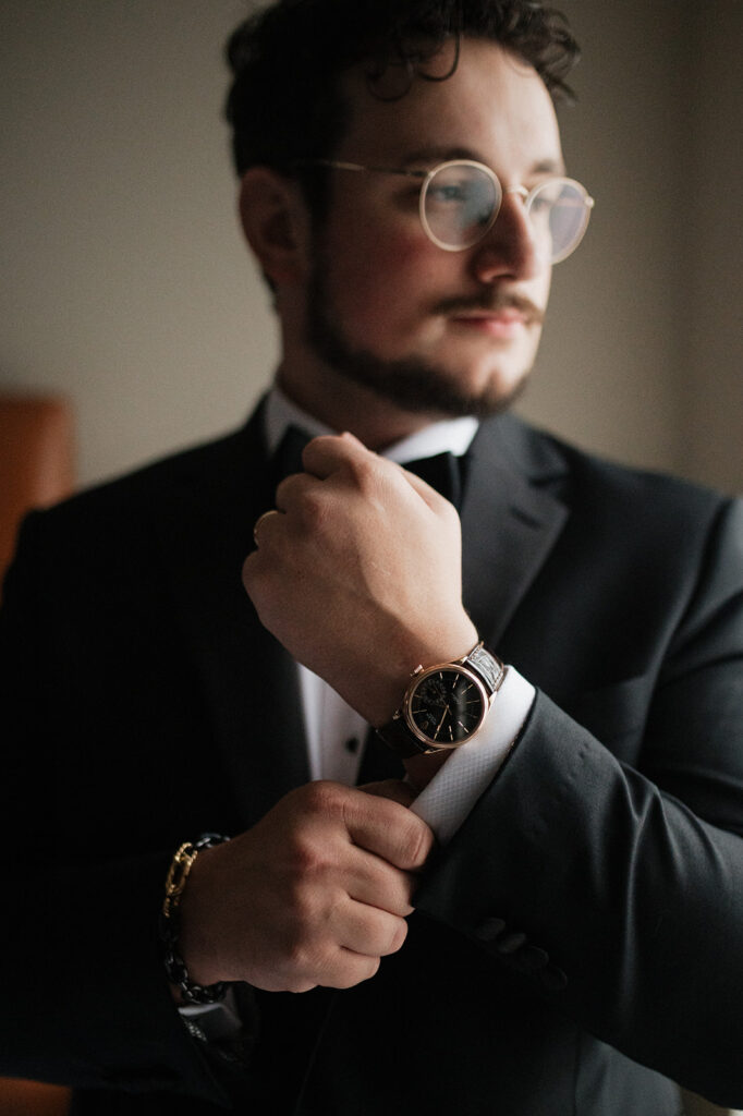 Groom at his black tie wedding in historic hotel in Cleveland, OH | J. Lynne Photography